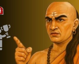 Acharya Chanakya standing with a young boy beside him holding a trophy, symbolizing success and guidance.