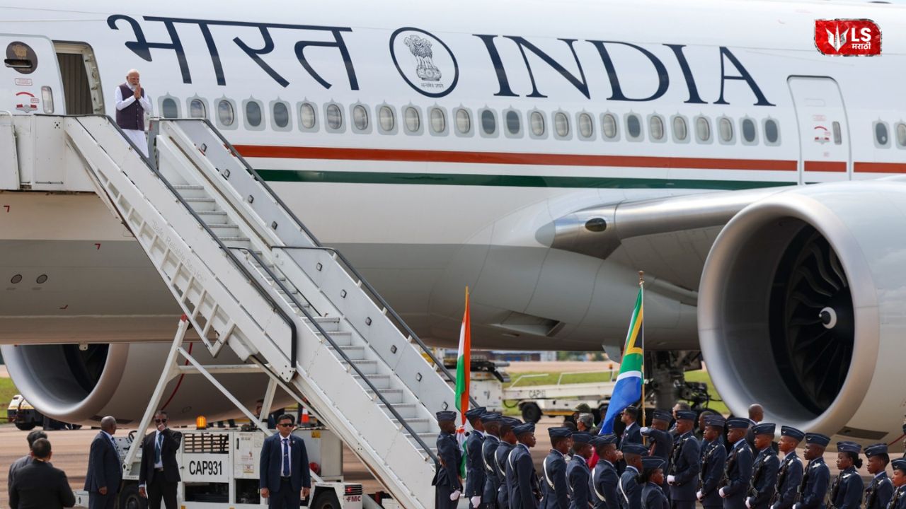 Prime Minister Narendra Modi stepping down from an aircraft and greeting with a Namaskar gesture