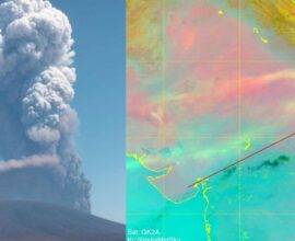 Hele Gubbi volcano in Ethiopia erupting with a massive ash cloud rising on one side, showing dark smoke spreading into the sky