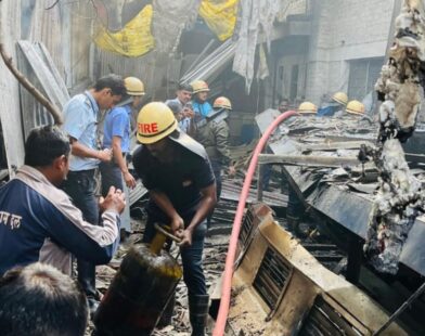 Firefighters and smoke seen after an LPG explosion at an industrial company in the Bhosari MIDC area