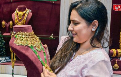 Woman checking gold jewellery at a shop