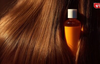 Mustard oil bottle partially hidden inside long hair