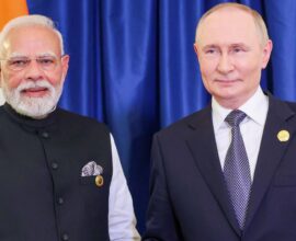 Vladimir Putin shaking hands with Indian Prime Minister Narendra Modi during an official meeting