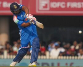 Rohit Sharma celebrating after hitting a six, marking his world record for the most sixes in ODI cricket