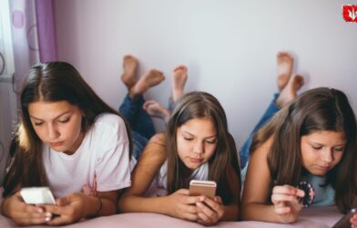 Illustration showing a smartphone with a “No Social Media under 16” sign, representing Australia’s ban on social media for children below 16 years