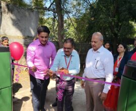 Inauguration of compost drum at IBM R. College showcasing sustainable waste management initiative