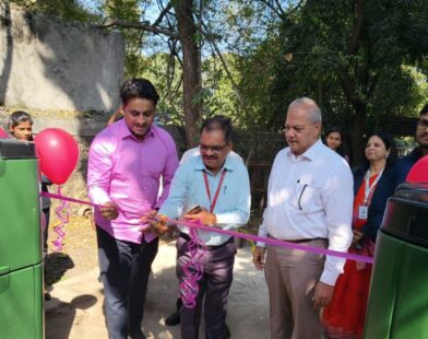 Inauguration of compost drum at IBM R. College showcasing sustainable waste management initiative