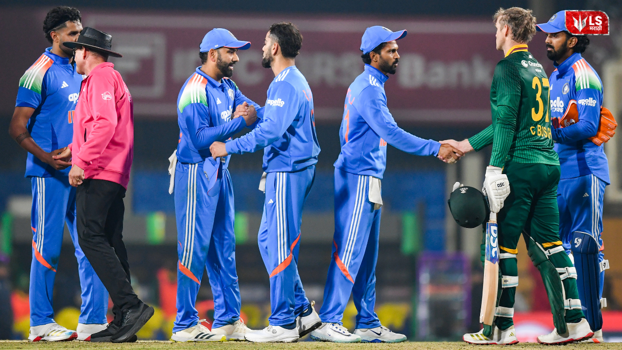 Rohit Sharma and Virat Kohli standing on the cricket field ahead of the India vs South Africa 2nd ODI match