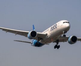 IndiGo aircraft at the airport with passengers affected by flight cancellations and refund delays