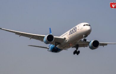 IndiGo aircraft at the airport with passengers affected by flight cancellations and refund delays