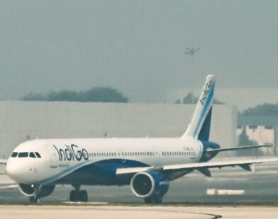 IndiGo aircraft parked at the airport as flight cancellations increase, highlighting the airline’s growing operational crisis