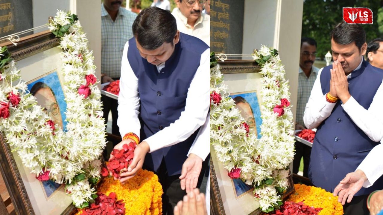 Devendra Fadnavis paying tribute to Dr. Babasaheb Ambedkar by offering flowers and garlanding his photo during a memorial event