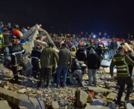 Collapsed building in a Moroccan city with rescue teams working at the site after a deadly accident