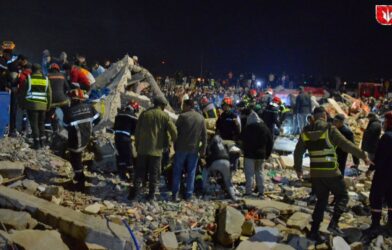Collapsed building in a Moroccan city with rescue teams working at the site after a deadly accident