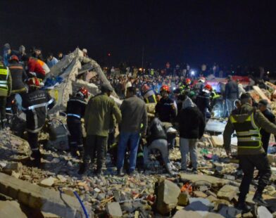 Collapsed building in a Moroccan city with rescue teams working at the site after a deadly accident