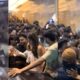 Actress Nidhi Agrawal surrounded by fans after getting caught in a crowd during Da Raja Saab film event