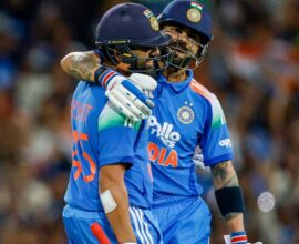 Rohit Sharma and Virat Kohli celebrating on the cricket field after securing top two positions in ICC ODI rankings
