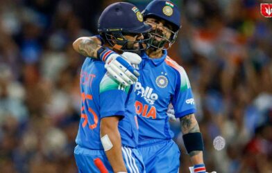 Rohit Sharma and Virat Kohli celebrating on the cricket field after securing top two positions in ICC ODI rankings