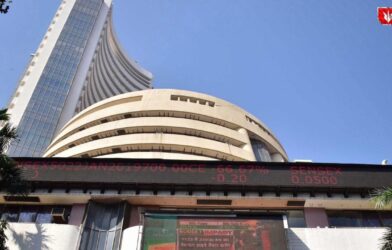 Stock market display board showing declining indices as Sensex drops 65 points and Nifty falls 27 points at closing