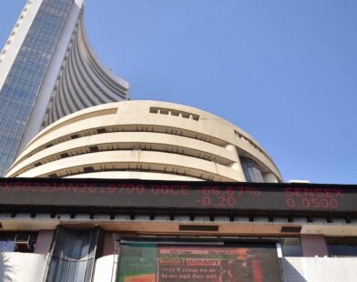 Stock market display board showing declining indices as Sensex drops 65 points and Nifty falls 27 points at closing