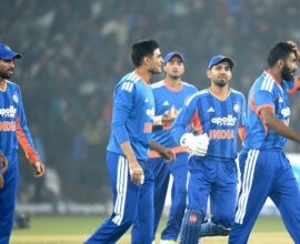 Indian cricket players celebrating after defeating South Africa in the first T20 match, with South Africa getting all out for 74 runs