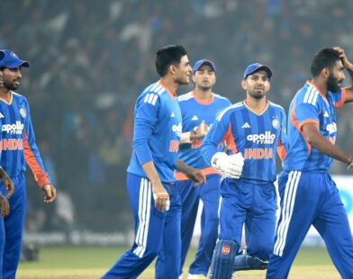Indian cricket players celebrating after defeating South Africa in the first T20 match, with South Africa getting all out for 74 runs