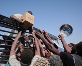 Scene showing destruction after a drone strike in Sudan, with debris scattered around a kindergarten affected by the attack