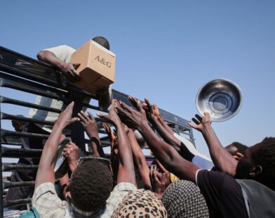 Scene showing destruction after a drone strike in Sudan, with debris scattered around a kindergarten affected by the attack