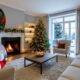 Beautiful Christmas home decoration with lights, tree, stylish outfits and gift boxes