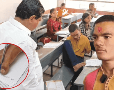 Writing paper with pen between toes